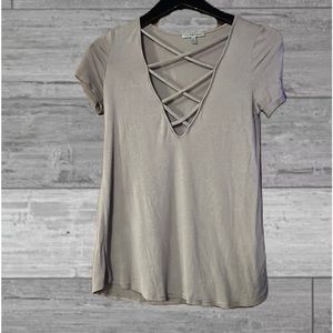 Deep V Neck short sleeve shirt with cross cross detail